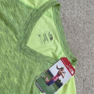 Brand new with tags. North Face moister wicking top in fluorescent yellow green.